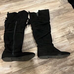 Lightly worn black up to the knee flats size 6.5